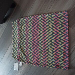 🌞  NWT- LuLaroe Cassie orange,yellow & turquoise pattern pencil skirt